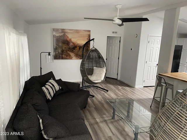 a kitchen with a sink cabinets and window