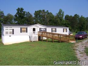 230 Buck Branch Rd Mill Spring Mill Spring, NC 28756 - Photo 1 of 2 a view of a house with a yard
