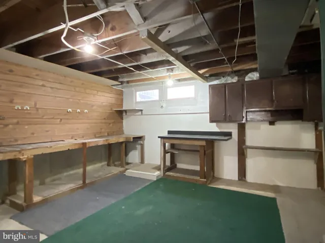 a utility room with fireplace dryer and washer