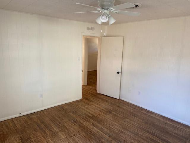 2617 39th Street Lubbock, TX 79413 - Photo 11 of 12 wooden floor in an empty room