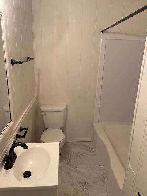 2617 39th Street Lubbock, TX 79413 - Photo 12 of 12 a bathroom with a sink and a toilet