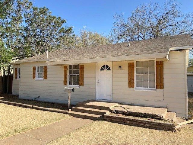 2617 39th Street Lubbock, TX 79413 - Photo 2 of 12 a front view of a house with a yard