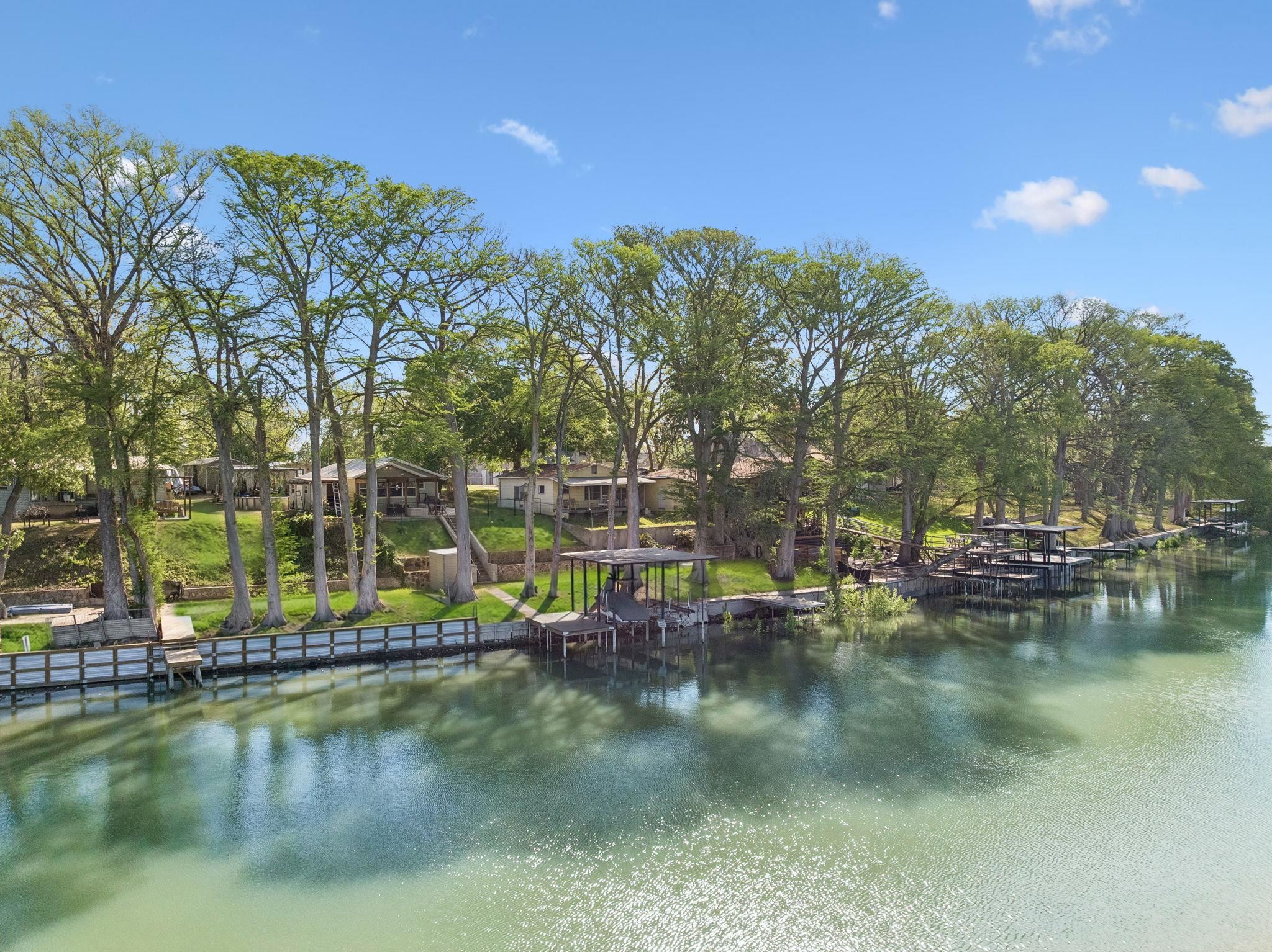 230 Lee Street Seguin, TX 78155 - Photo 2 of 40 a view of residential houses with outdoor space and lake view