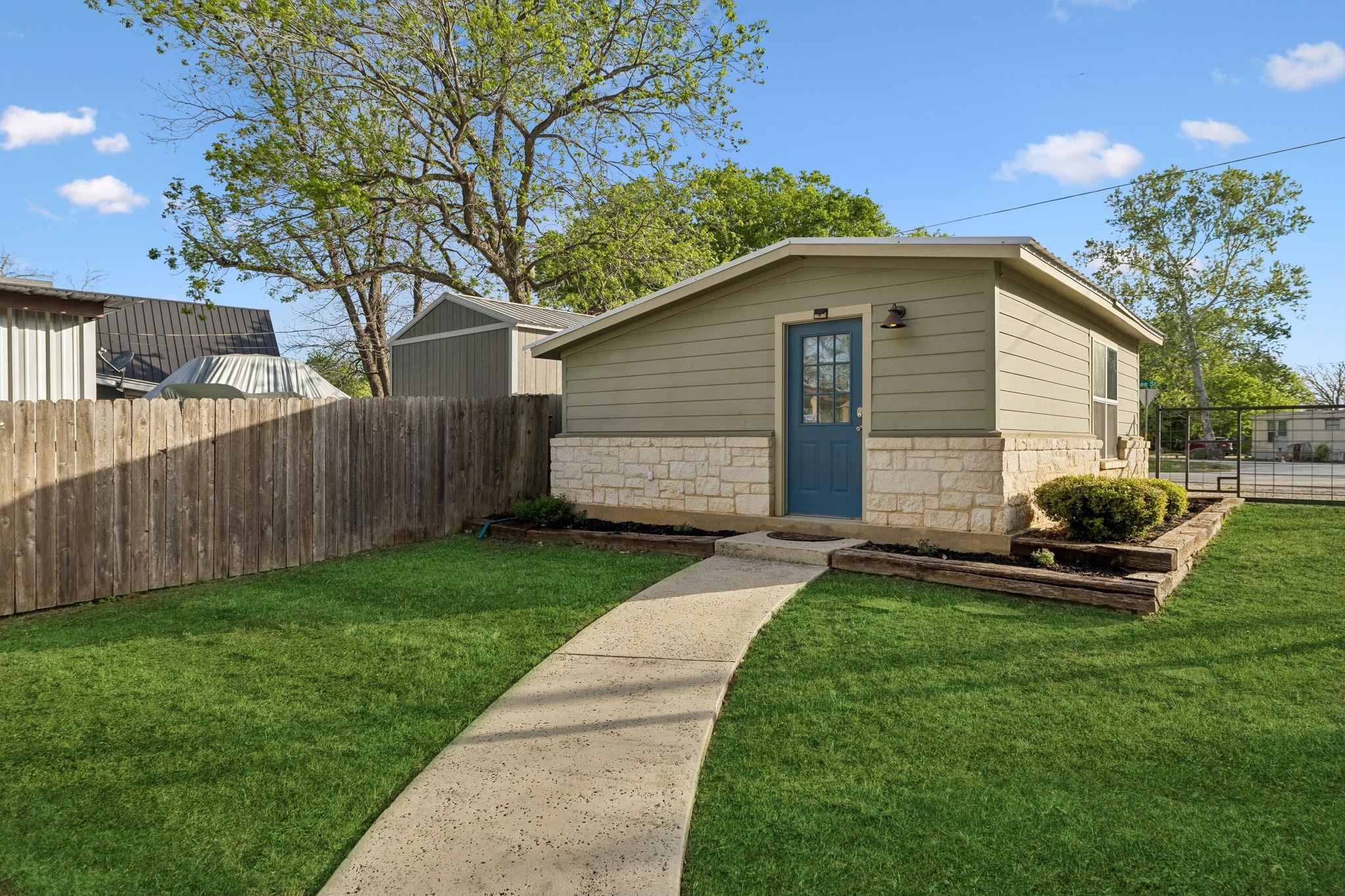 230 Lee Street Seguin, TX 78155 - Photo 29 of 40 a front view of house with yard and green space