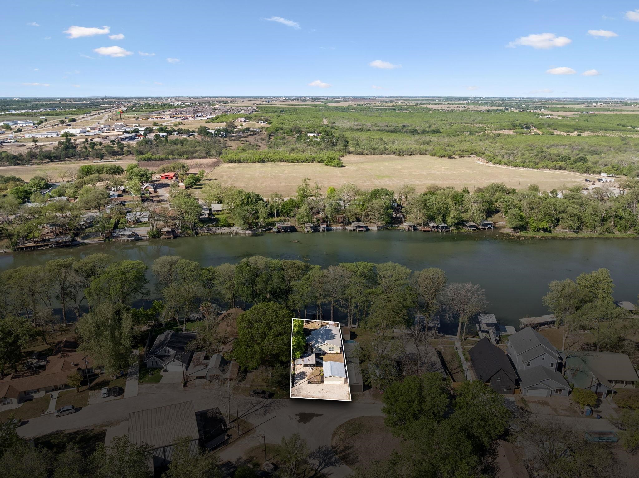 230 Lee Street Seguin, TX 78155 - Photo 39 of 40 an aerial view of a city with lots of residential buildings lake and ocean view