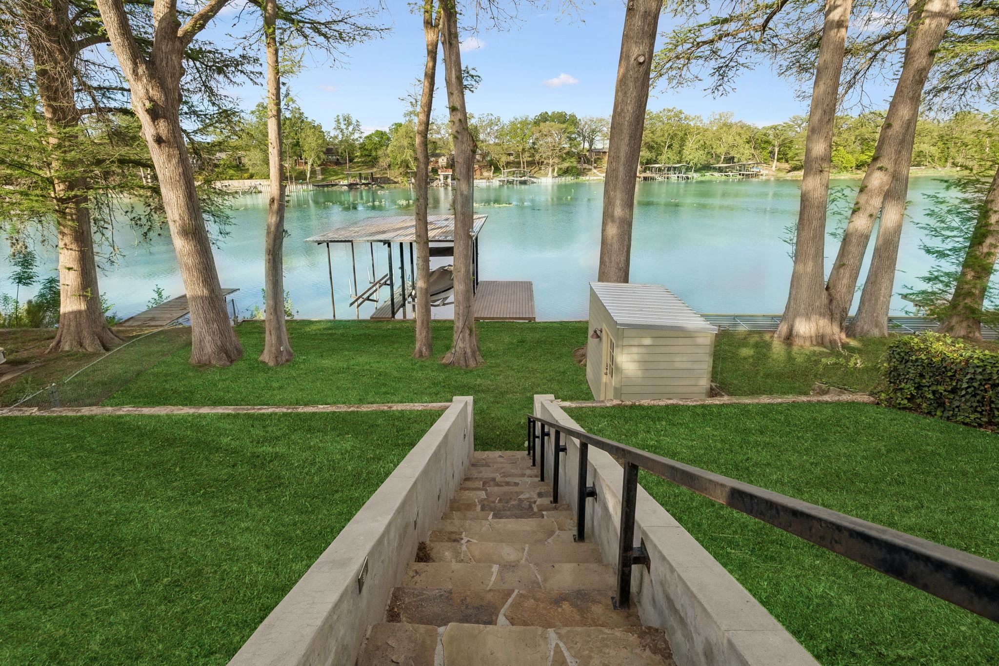 230 Lee Street Seguin, TX 78155 - Photo 9 of 40 a view of a garden with lake