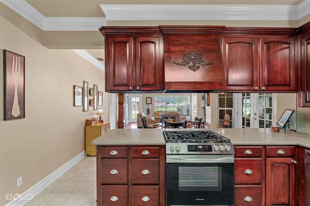 10722 Provence Place Keithville, LA 71047 - Photo 13 of 23 Very recent appliances include a new gas range and dishwasher