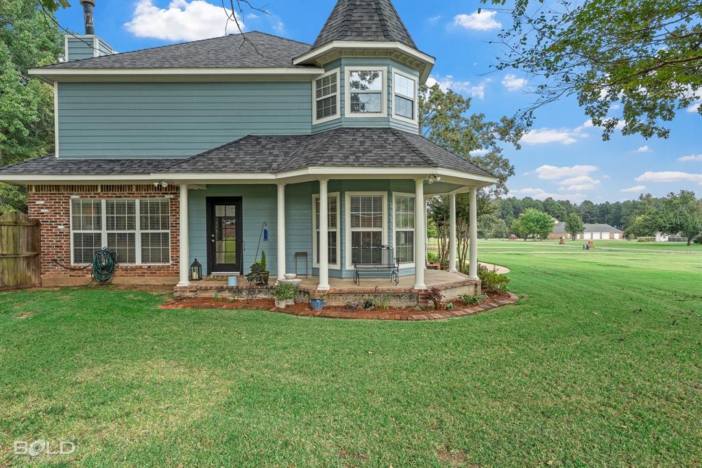10722 Provence Place Keithville, LA 71047 - Photo 2 of 23 Awesome wrap around porch-fully landscaped
