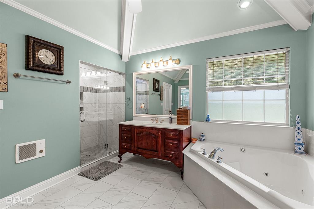 10722 Provence Place Keithville, LA 71047 - Photo 22 of 23 The bathroom has a cathedral ceiling!