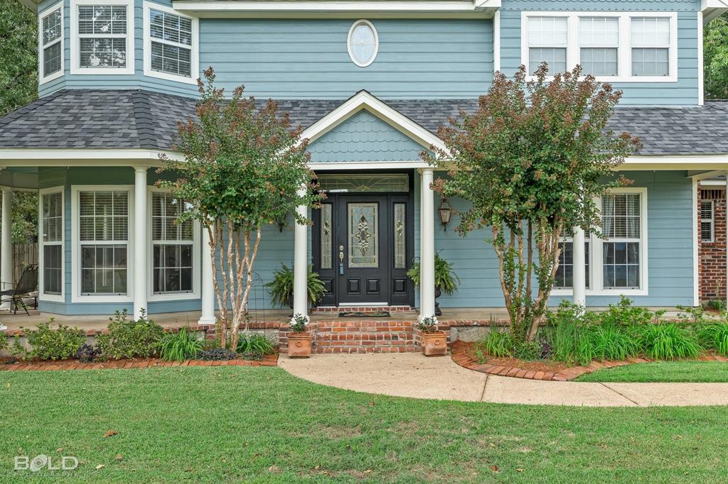 10722 Provence Place Keithville, LA 71047 - Photo 4 of 23 Very welcoming front with fresh landscaping across the front, side and sidewalk