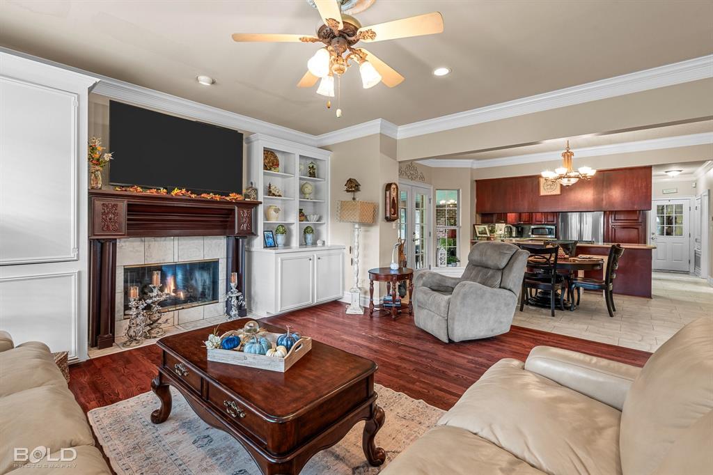 10722 Provence Place Keithville, LA 71047 - Photo 10 of 23 The living room opens to the dining area and kitchen