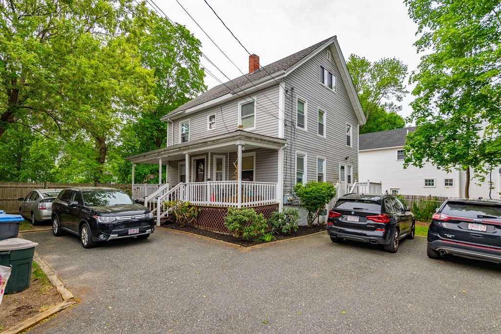 a car parked in front of a house