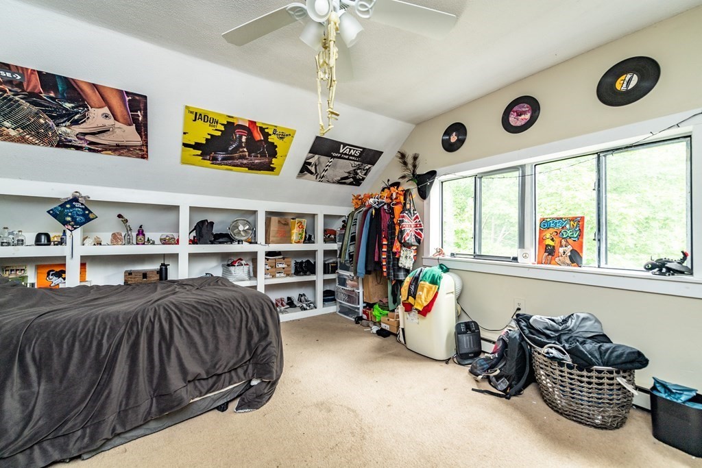 28 Walnut Street Natick, MA 01760 - Photo 14 of 24 a bedroom with furniture and a window