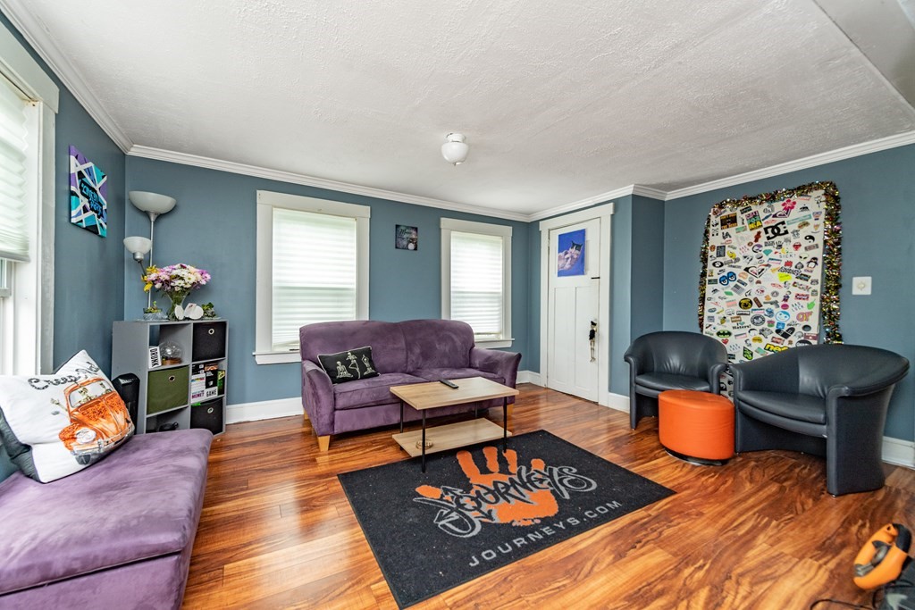 28 Walnut Street Natick, MA 01760 - Photo 8 of 24 a living room with furniture and a window