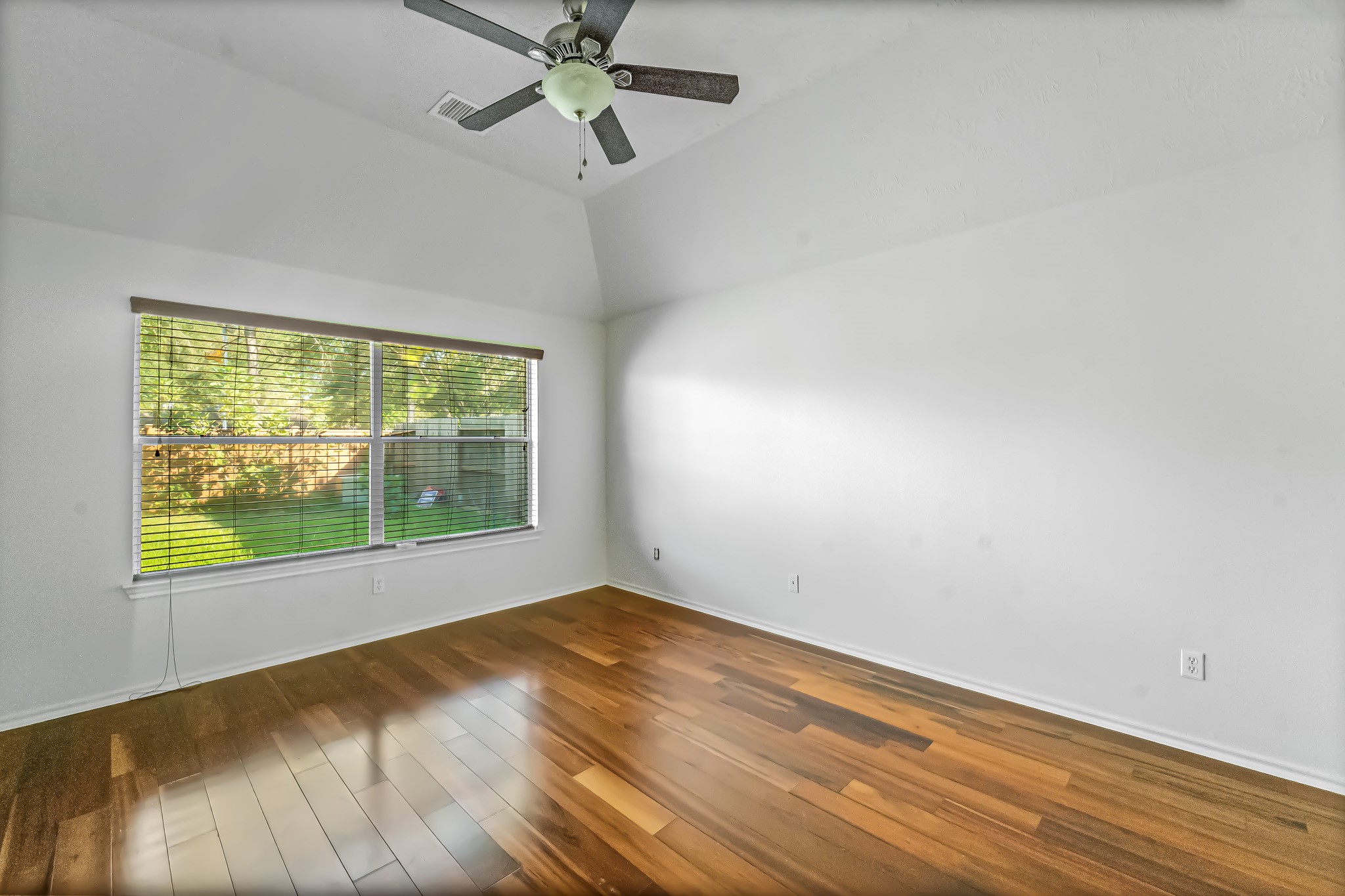 16210 Bloom Meadow Trail Cypress, TX 77433 - Photo 12 of 32 an empty room with a window