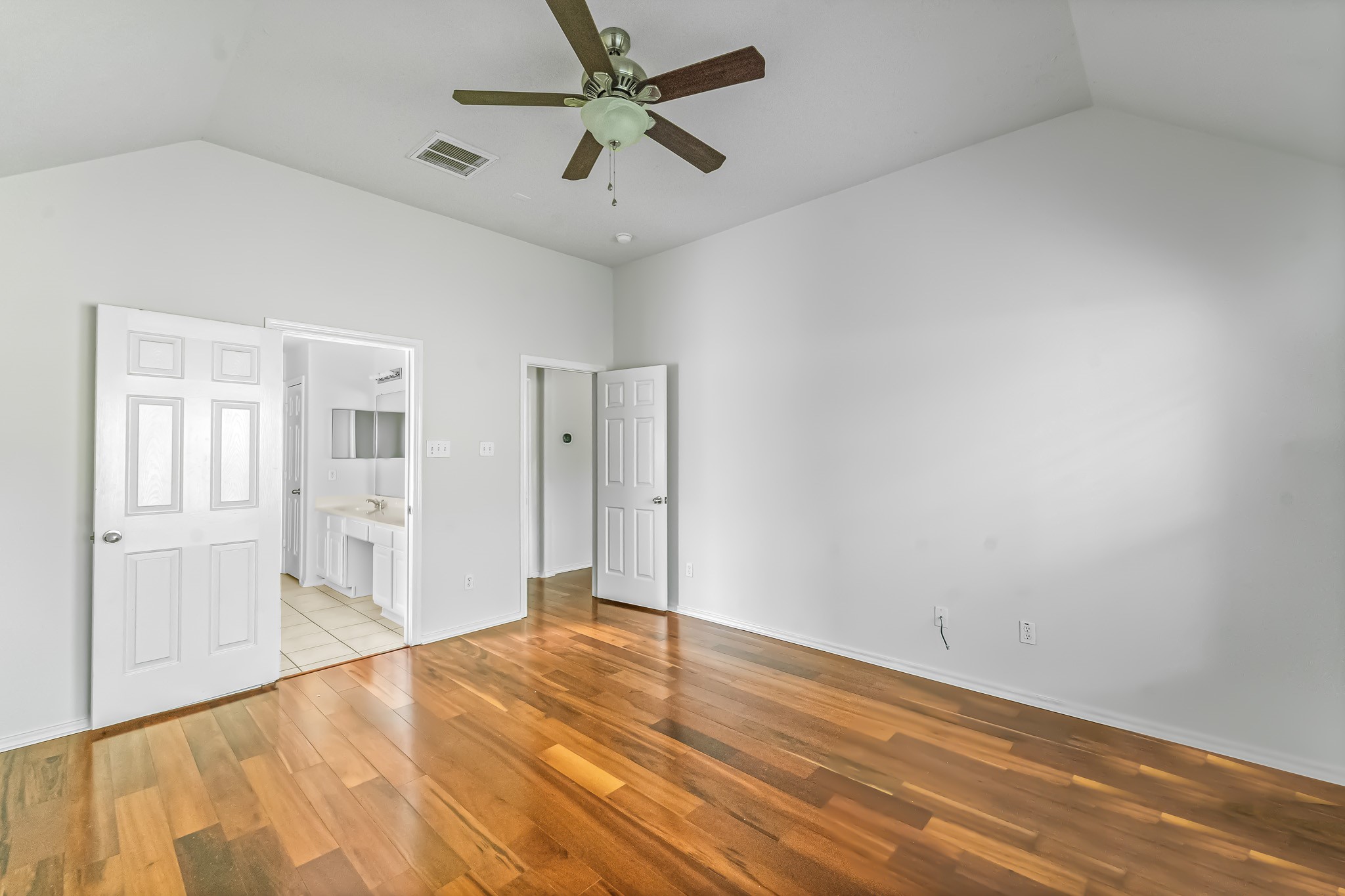 16210 Bloom Meadow Trail Cypress, TX 77433 - Photo 13 of 32 wooden floor in an empty room