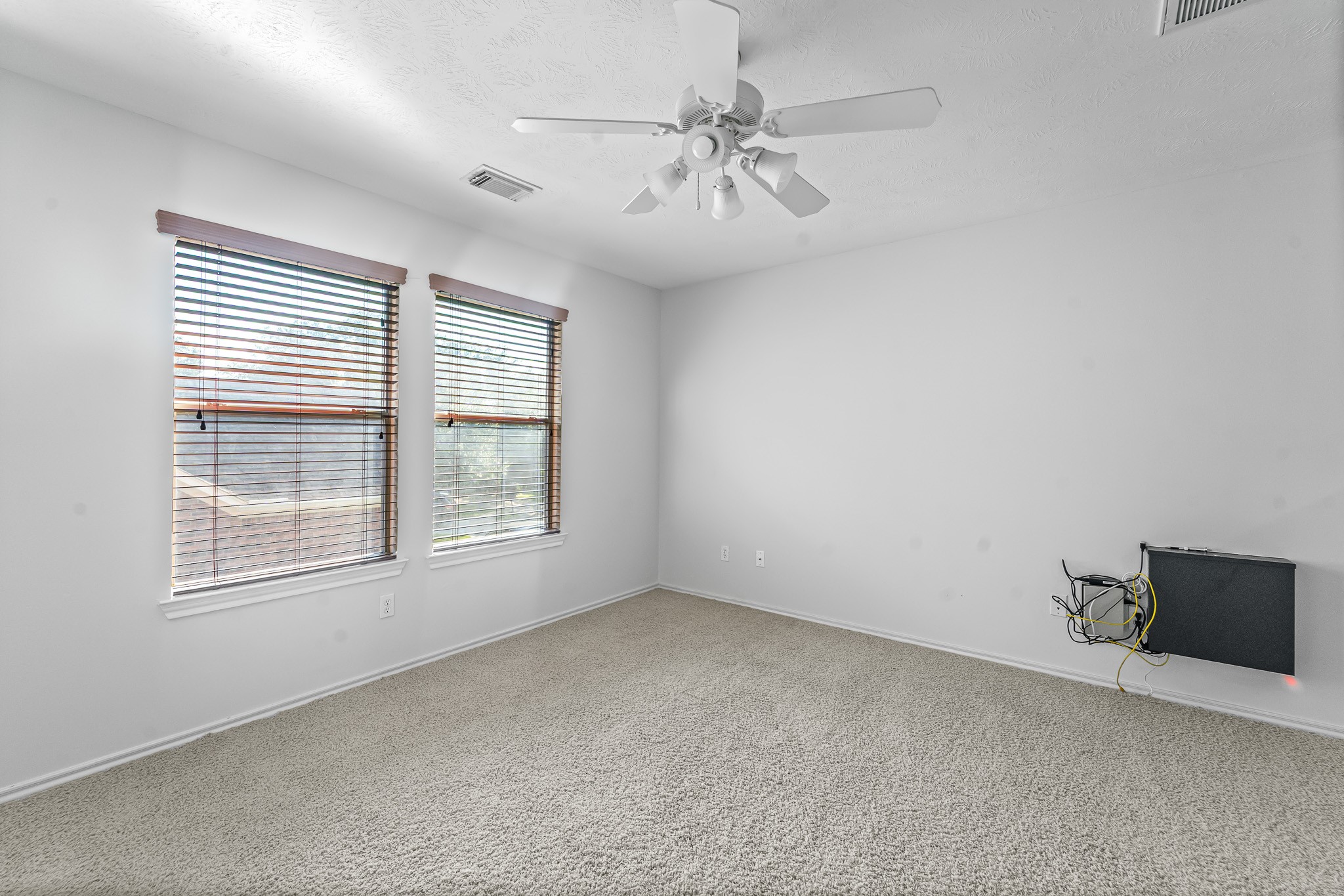 16210 Bloom Meadow Trail Cypress, TX 77433 - Photo 21 of 32 a view of an empty room with a window