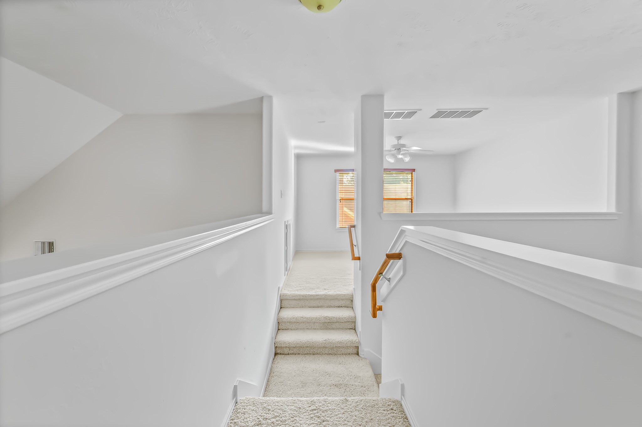 16210 Bloom Meadow Trail Cypress, TX 77433 - Photo 29 of 32 a view of entryway and hall with wooden floor
