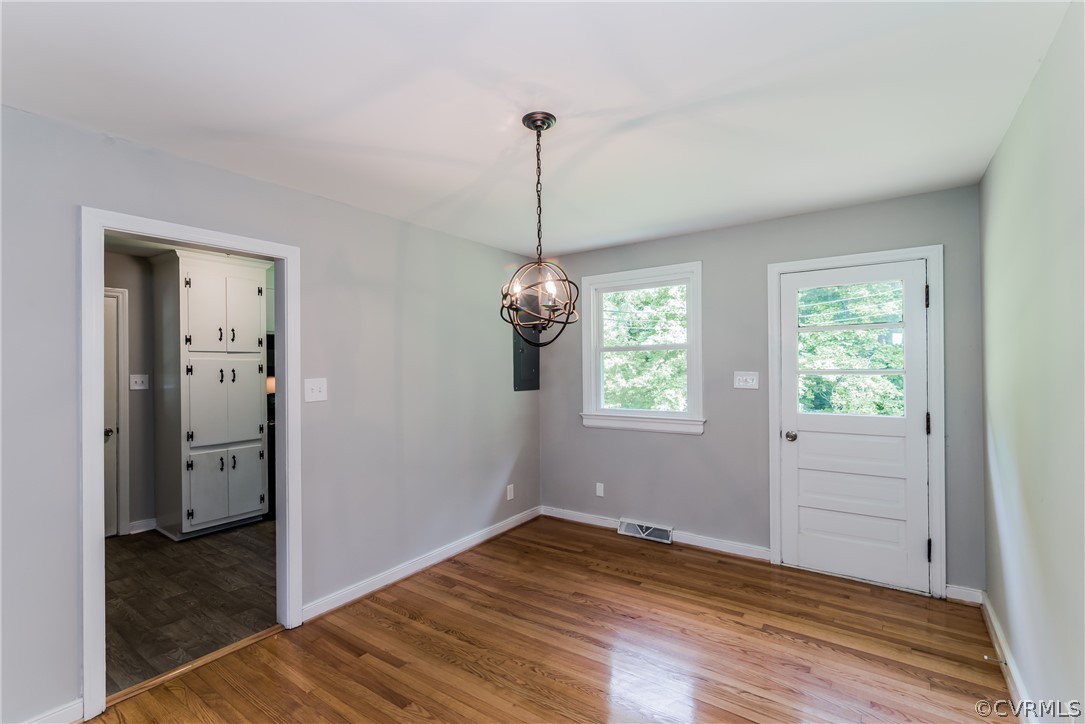 11407 Reedy Branch Road South Chesterfield, VA 23838 - Photo 15 of 50 wooden floor in an empty room with a window