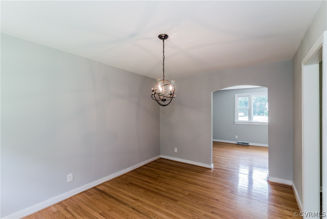 11407 Reedy Branch Road South Chesterfield, VA 23838 - Photo 16 of 50 a view of an empty room with wooden floor and a window