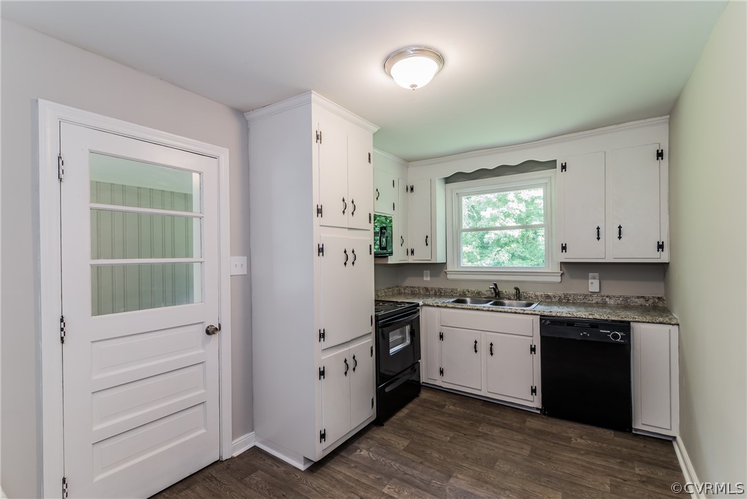 11407 Reedy Branch Road South Chesterfield, VA 23838 - Photo 18 of 50 a kitchen with white cabinets and sink