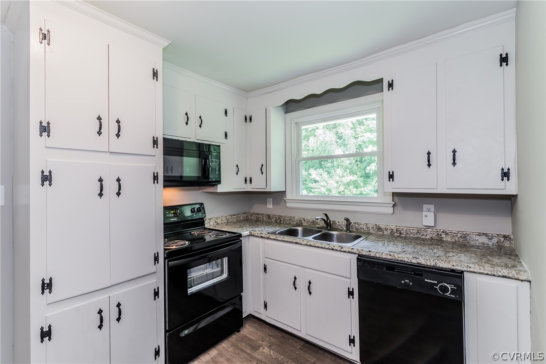 11407 Reedy Branch Road South Chesterfield, VA 23838 - Photo 19 of 50 a kitchen with granite countertop white cabinets and white appliances