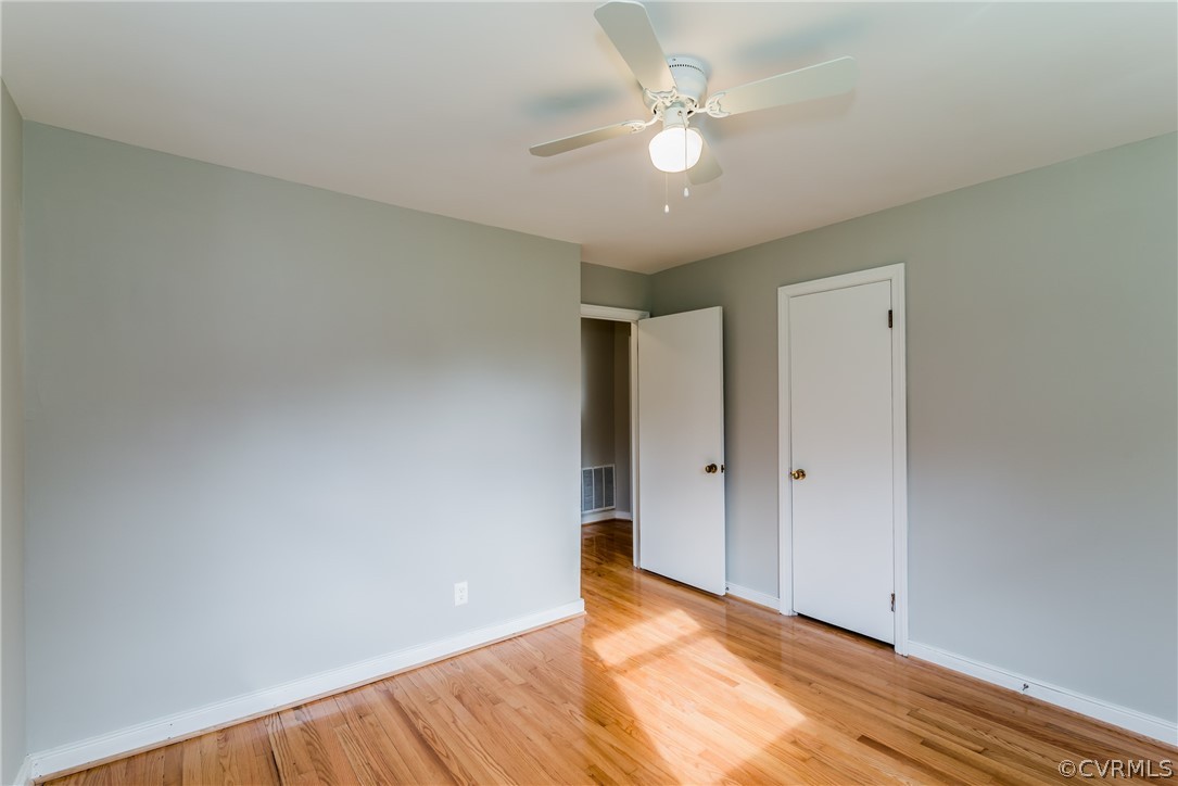 11407 Reedy Branch Road South Chesterfield, VA 23838 - Photo 27 of 50 a view of an empty room with chandelier fan