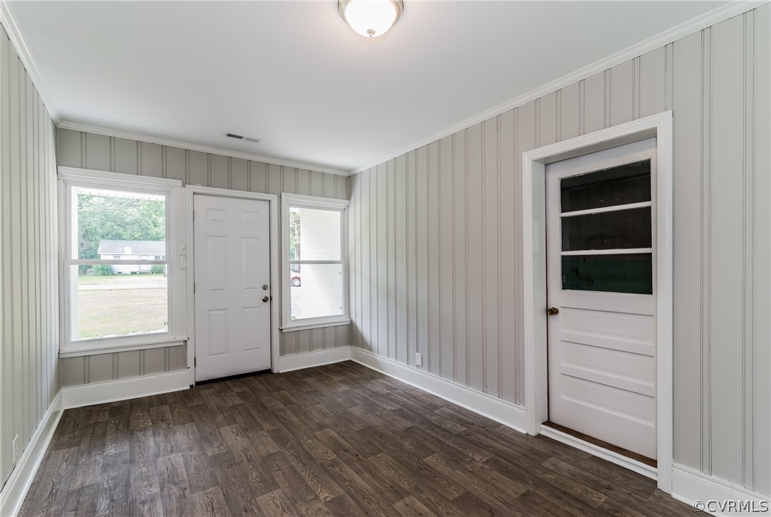 11407 Reedy Branch Road South Chesterfield, VA 23838 - Photo 39 of 50 an empty room with wooden floor cabinet and windows