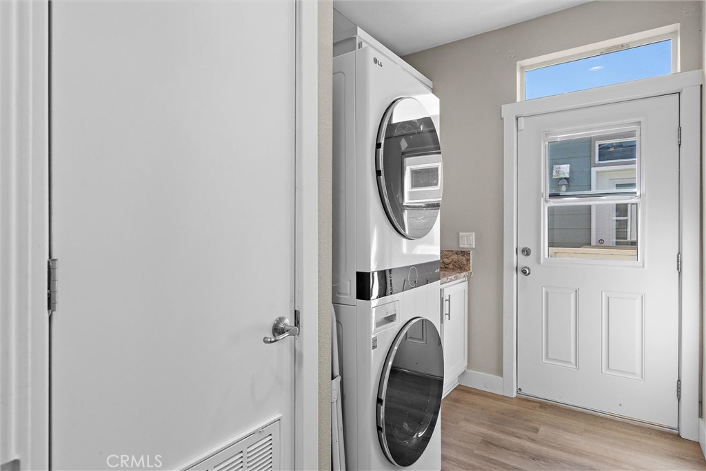 1460 Main Street, Unit 112 Cambria, CA 93428 - Photo 13 of 19 a utility room with dryer and washer