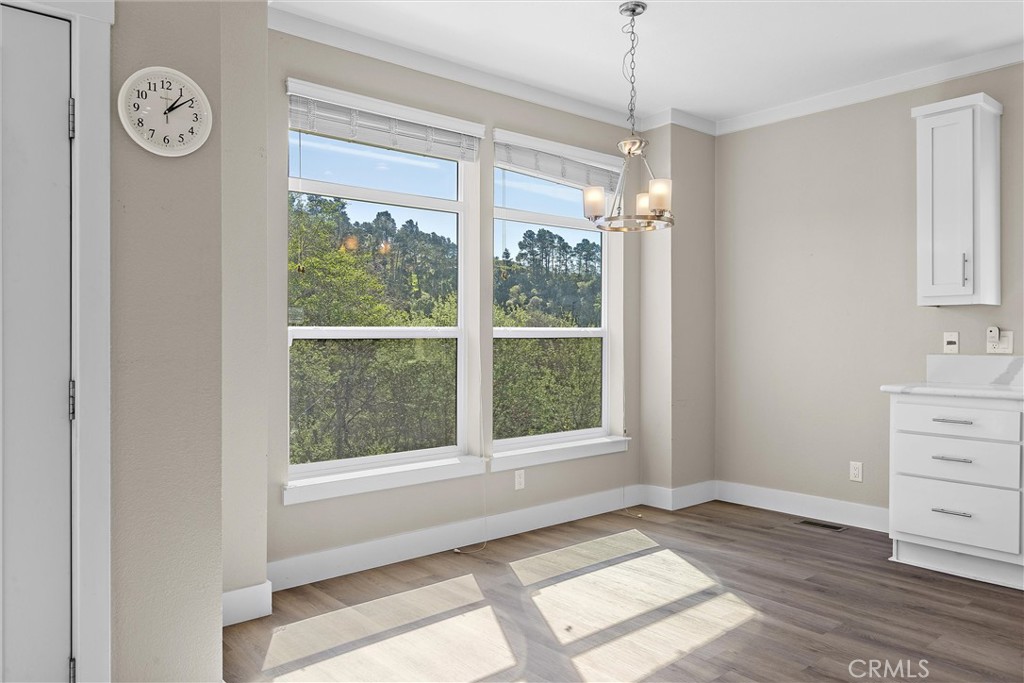 1460 Main Street, Unit 112 Cambria, CA 93428 - Photo 8 of 19 a view of workspace with window and ceiling fan