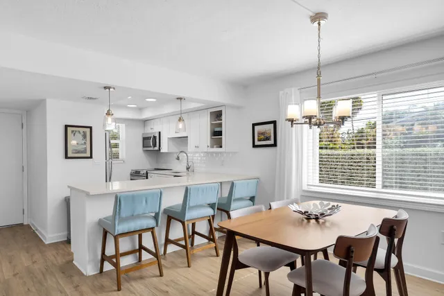 a living room with fireplace furniture and a flat screen tv