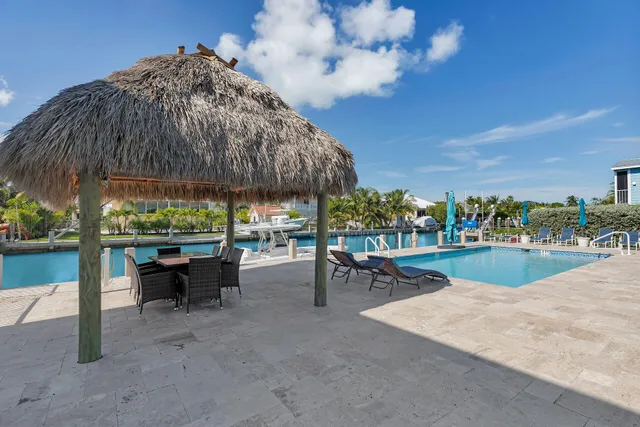 a view of a house with swimming pool