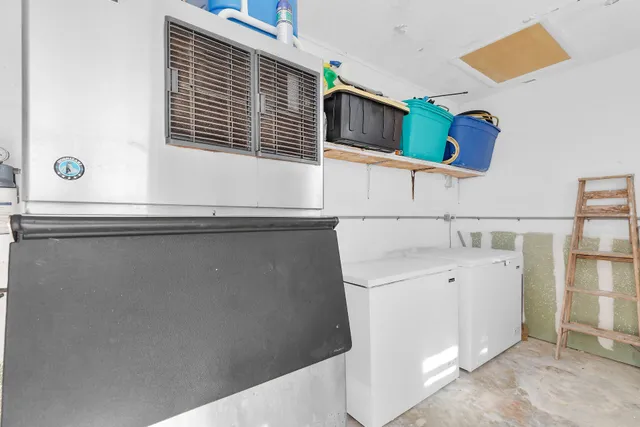 an aerial view of residential building and lake