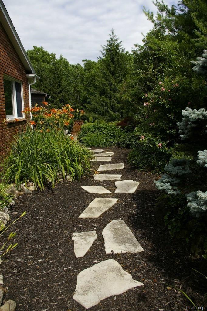 20300 Beck Road Northville, MI 48167 - Photo 19 of 22 Stone Walkway to Back Patio