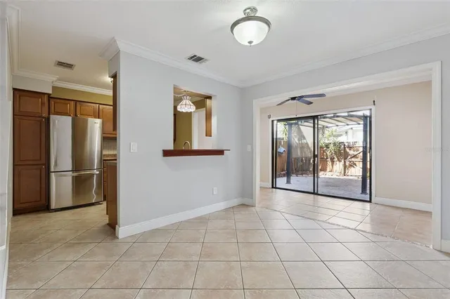 a view of an empty room and window