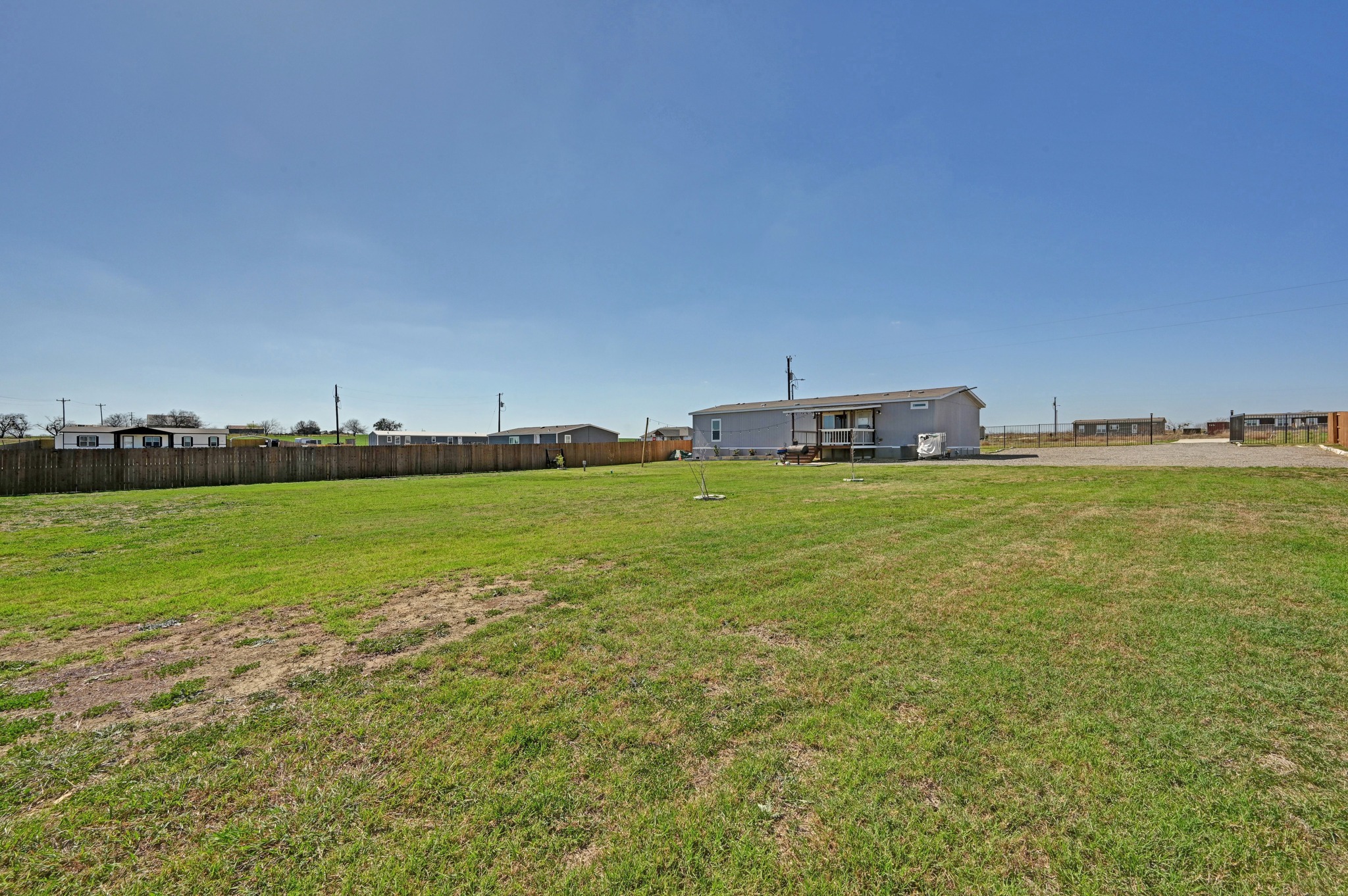 117 Castellana Way Elgin, TX 78621 - Photo 26 of 28 View of yard