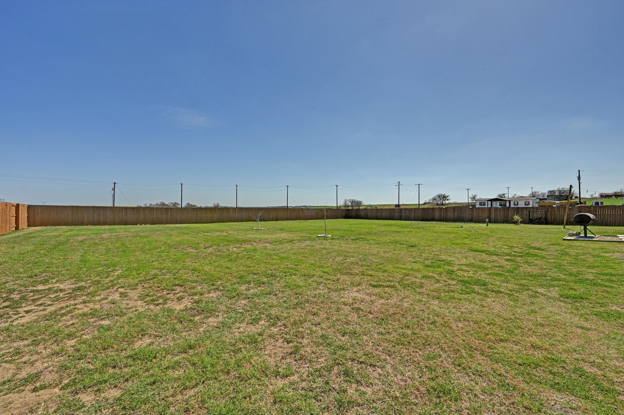 117 Castellana Way Elgin, TX 78621 - Photo 27 of 28 View of yard