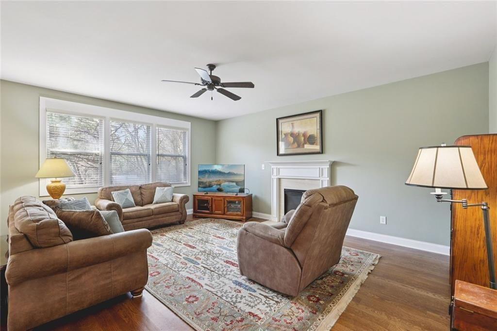 4460 Granby Circle Cumming, GA 30041 - Photo 14 of 34 a living room with furniture and a window