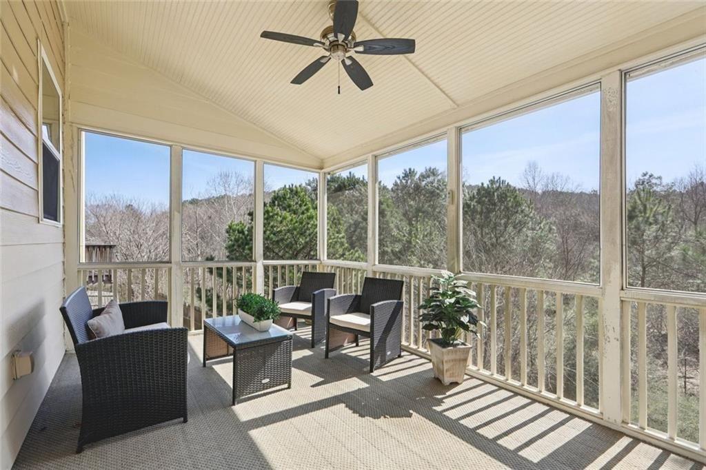 4460 Granby Circle Cumming, GA 30041 - Photo 25 of 34 a living room with furniture and a window