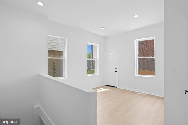 an empty room with windows