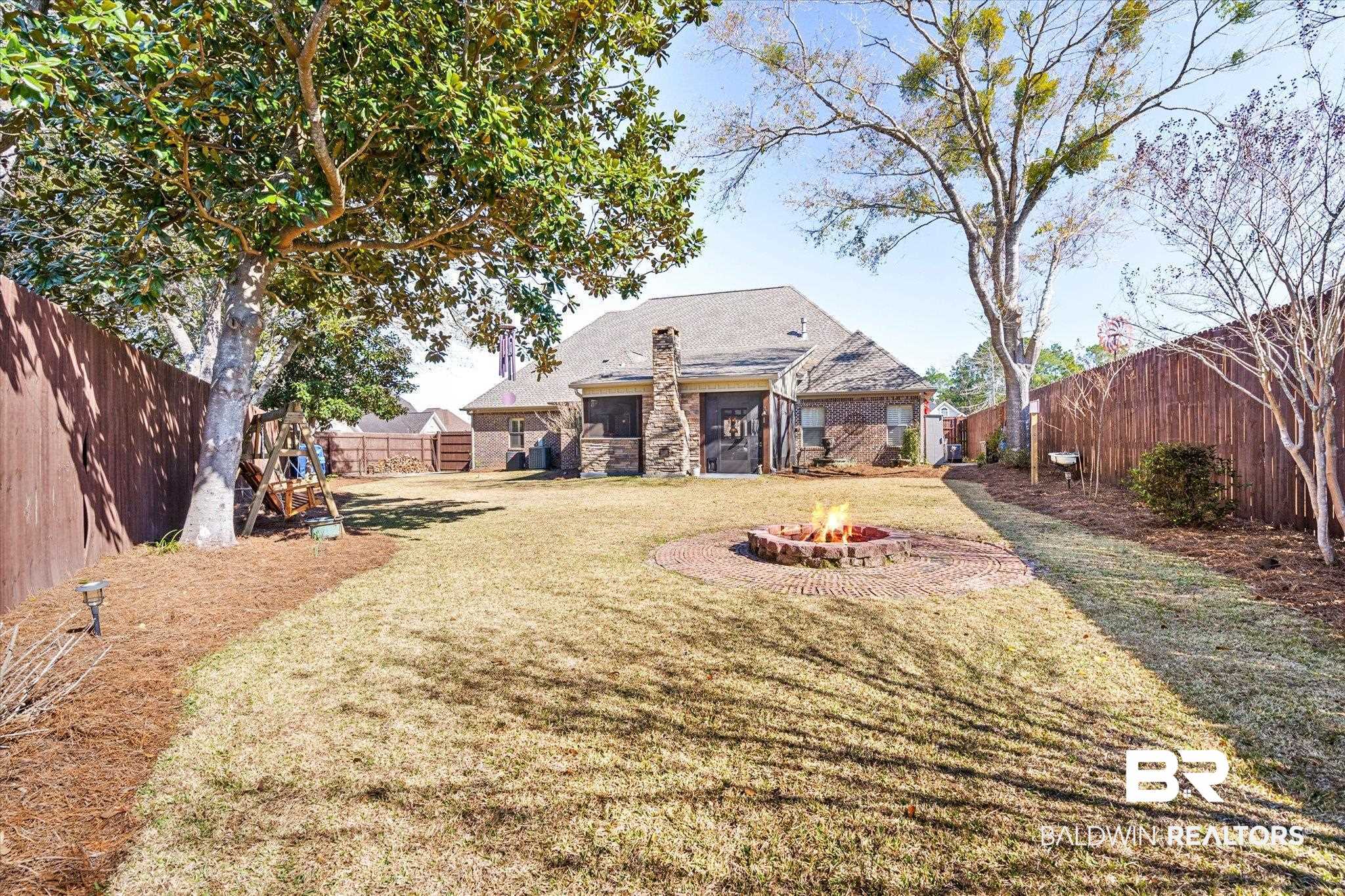 5683 Spring Landing Drive Theodore, AL 36582 - Photo 31 of 49 View of yard with an outdoor fire pit