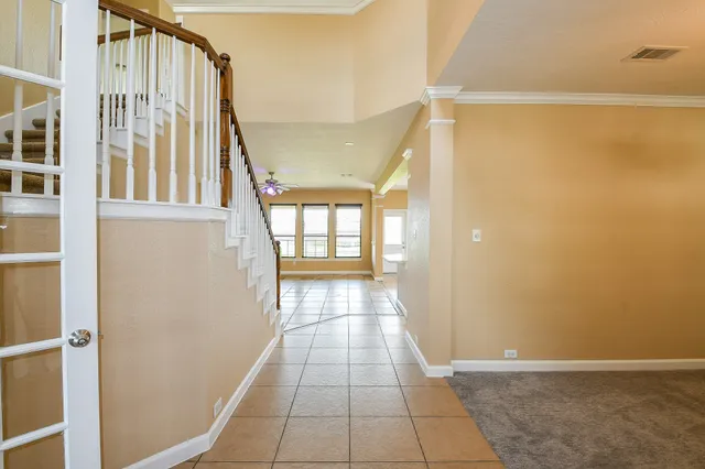 a view of a hallway with windows