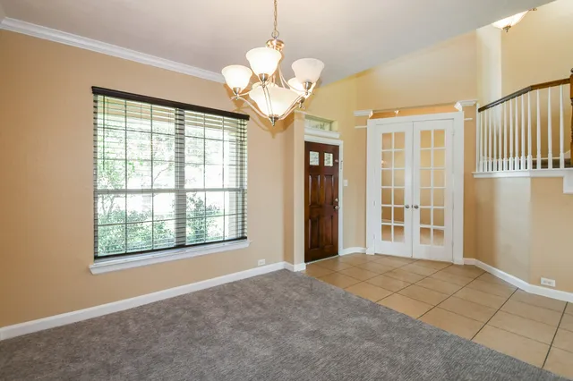 a view of a room with a large window