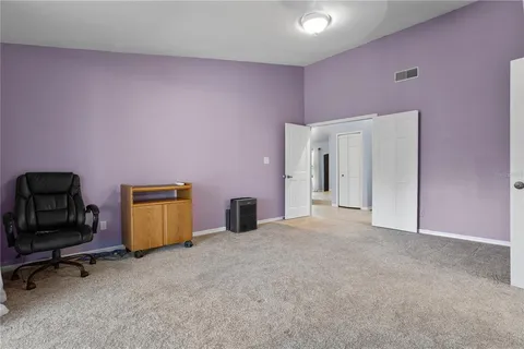 a bathroom with a sink a tub and a mirror