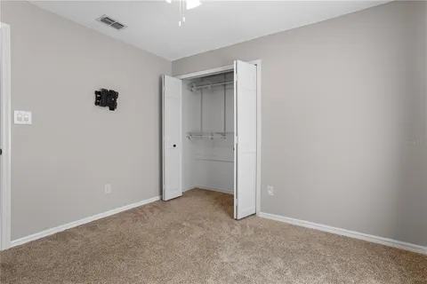 a bathroom with a sink a vanity a mirror and a shower