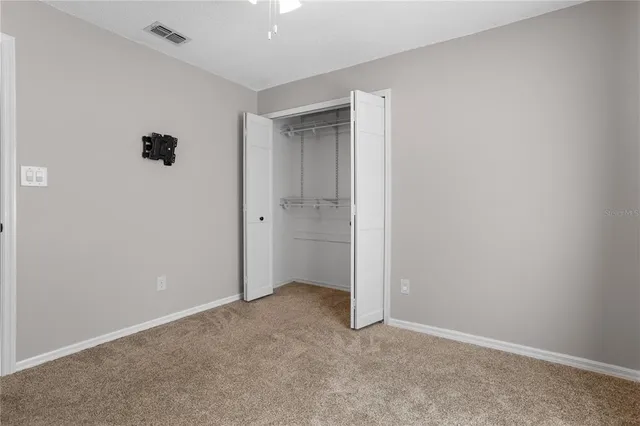 a bathroom with a sink a vanity a mirror and a shower
