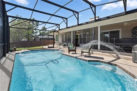a swimming pool with a couch