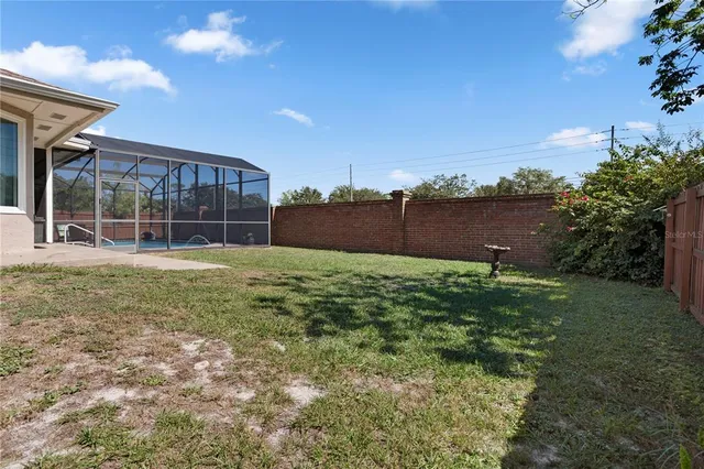 a house view with a sitting space and garden space