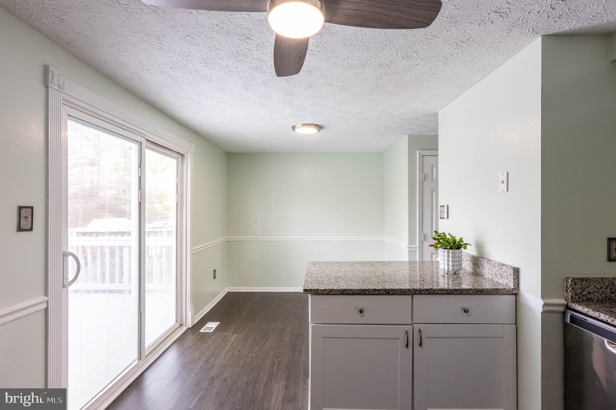 27 Cavan Green Nottingham, MD 21236 - Photo 14 of 31 a kitchen with a granite countertop sink and a window