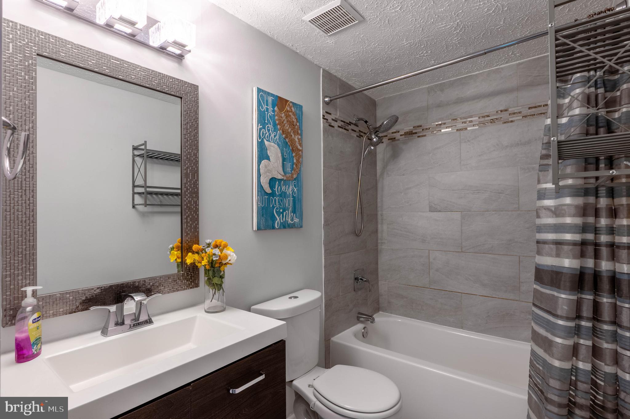 27 Cavan Green Nottingham, MD 21236 - Photo 15 of 31 a bathroom with a sink toilet and shower